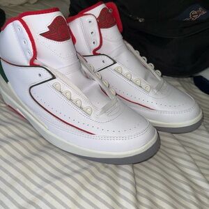 Jordan White and Red Sneakers with Green Accents